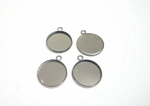 3pz castone base per cabochon acciaio inox interno 18mm colore argento scuro - Foto 1 di 1