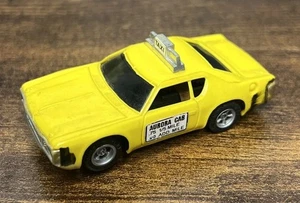 Vintage AFX AMC Matador Giallo Aurora Cab Aeroporto Taxi Slot Car - Foto 1 di 7