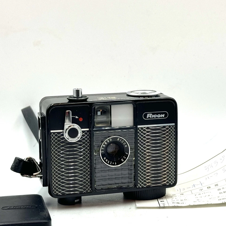 US Duty Paid [CLA'd] Ricoh Auto Half SE Half Frame Film Camera Black +NEW SEALS - Image 1 of 4