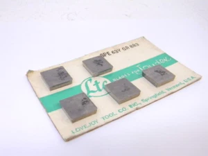 NEW SURPLUS 5PCS. LOVEJOY SPE 63Y GRADE: 883  CARBIDE INSERTS - Picture 1 of 4