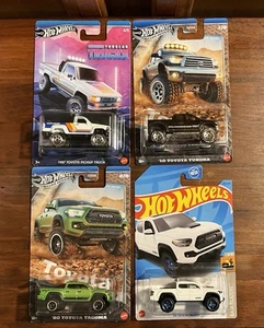 Hot Wheels 2020 Toyota Tacoma (1 Green & 1 White) + 1 Matchbox 2024 Tacoma (W) - Picture 1 of 11