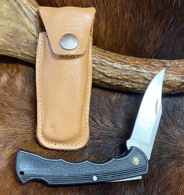 1993 Buck, США., Bucklite 422 замок складной нож, черный, кожаные ножны - Изображение 1 из 4