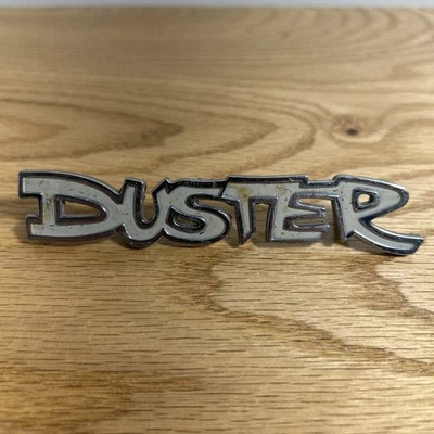 MOPAR 1972-1976 PLYMOUTH DUSTER NAMEPLATE CHROME FENDER EMBLEM P/N 3680304  - Image 1 of 4