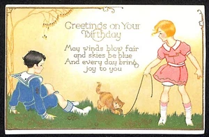 Birthday Postcard - Boy and Girl Play Outdoors with Kitten Cat EMB. c1915-20 - Picture 1 of 2