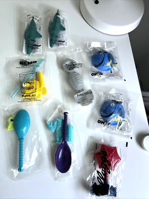 Vintage Kelloggs Cereal Toy Lot Spoon Atlantis Spiderman Nemo Disney Monsters - Image 1 of 4