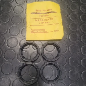 KIT serie Paraolio calotte forcella MARZOCCHI 34 mm ARIETE 9876A - Imagen 1 de 2