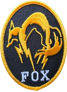 METAL GEAR SOLID FOX BLACK & GOLD PS4 BÜGELBILD TACTICAL ARMY MORAL PATCH SPIEL - Bild 1 von 2