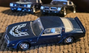 1/64 Auto World 1975 Pontiac Firebird Trans AM T/A Dark Blue Open Hood TA455 - Picture 1 of 12