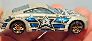 Nissan Z 2001 coche fundido suelto Sheriff John Brown Hot Wheels - Imagen 1 de 5