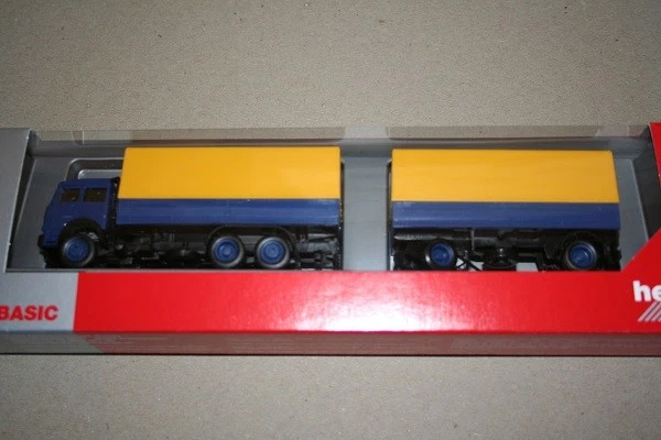 Herpa 309578 - 1/87 Iveco Magirus Piano / Rimorchio, Giallo/Blu - Nuovo - Immagine 1 di 1
