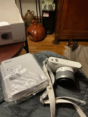 Nikon 1 J1 10.1MP Digital Camera with VR 10-30mm Lens - Full HD 1080p - White - Image 1 of 2