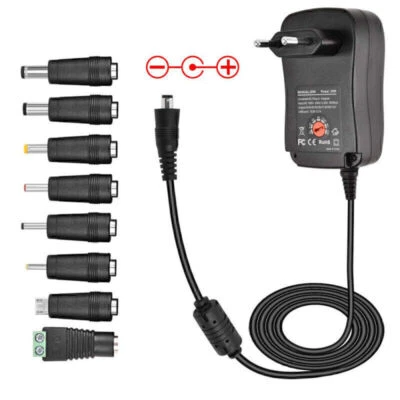 Universal Power Netzteil 2A Ladegerät Netzgerät 3V-12V mit 8 Adaptern +USB 30W - Bild 1 von 4