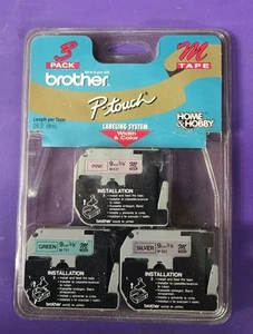 Brother ME793 P-Touch M Band 3/Pack, schwarz auf pink, grün und silber Pt100 & 110 - Bild 1 von 2