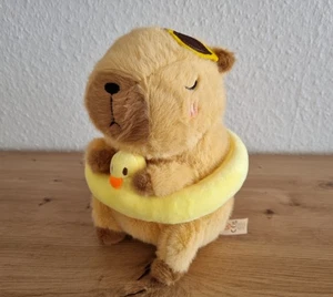 Plüschtier, Capybara mit abnehmbaren gelben Schwimmring ca. 22 cm, hellbraun Neu - Bild 1 von 8