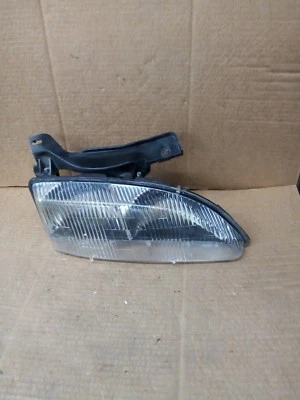 Faro delantero derecho para pasajero Chevrolet Cavalier 1997  Foto 1 de 3