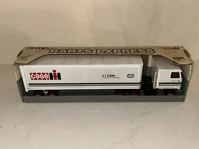 Semirremolque expreso Ertl Tenneco Case Parts 1986 de colección con remolque cerrado juguete Foto 1 de 4
