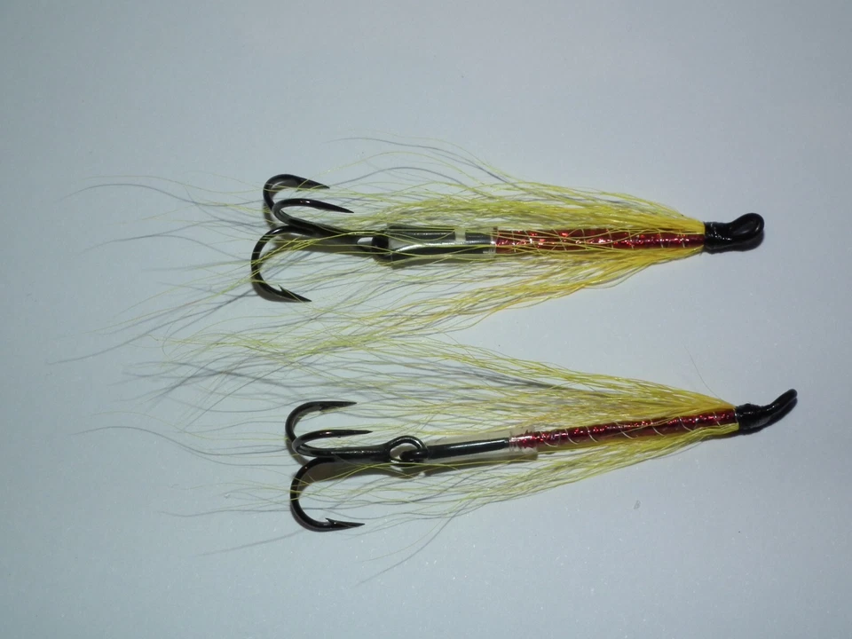 salmon/seatrout-------------------- 2 red & yellow 35mm waddingtons - Image 1 of 1
