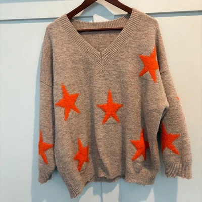 Suéter Tejido Star Intarsia Tostado Naranja Cuello en V Dobladillo Crudo Difuso Mujeres Grande Relajado Foto 1 de 4