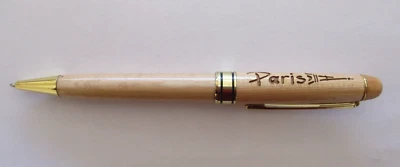 PARIS PEN SOUVENIR BLACK BALLPOINT EIFFEL TOWER TIMBER LOOK GOLD TONE - image 1 of 4
