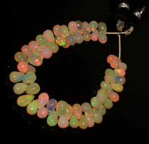 Piedras preciosas de ópalo de fuego natural tamaño 6x4 a 7x5 mm cuentas lisas en forma de gota hilo de 5,5" - Imagen 1 de 5
