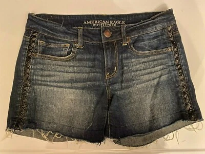 Pantalones Cortos de Jean American Eagle AEO Para Mujer Elásticos Talla 8 Azul Negro Cuero Cortes  Foto 1 de 4