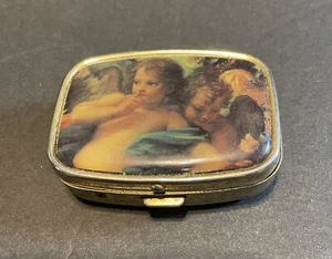 Vintage Raphael Cherubs Gold Tone Pill/Trinket Box - Picture 1 of 3