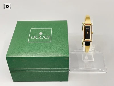 【Почти как новый с коробкой】 Gucci 1500L 12 мм черный циферблат золото Qz женщин - доставка из США - Изображение 1 из 4