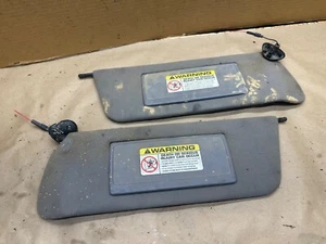 Parasoles Jeep Cherokee XJ 97-01 de un cable OEM grises parasoles de fábrica - Imagen 1 de 12