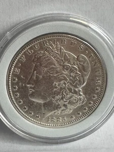 1885 Morgan Silver Dollar #119 - Picture 1 of 4
