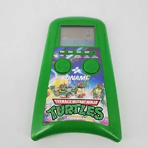 FÜR ERSATZTEILE/VERKAUFT WIE BESEHEN 1989 Konami Teenage Mutant Ninja Turtles Handheld-Spiel TMNT - Bild 1 von 8