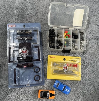 Carcasas de coche de radiocontrol Xmods con herramientas, piezas, ruedas, motores Hummer Pontiac Truckin’ Foto 1 de 4