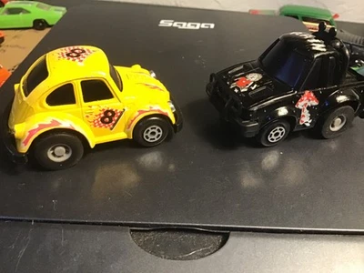 80's VINTAGE Yellow VW VOLKSWAGEN BUG BEETLE PULL BACK #3403 & Black Rain Truck - Image 1 of 4