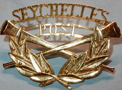 EARLY VINTAGE SEYCHELLES POST OFFICE DELIVERY POSTMAN CAP BADGE - Image 1 of 2