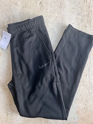 Pantalones deportivos de entrenamiento con dobladillo abierto Nike Therma-FIT talla M negros 932253 010 Foto 1 de 4