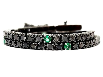 Bracciale Tennis Astralia Oro Brunito e Oro Bianco con Diamanti neri e Smeraldi  - Immagine 1 di 4