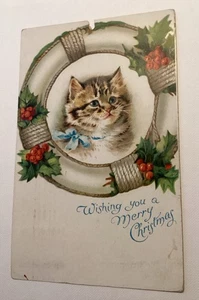 Vintage gato gatito Navidad 1909 postal salvavidas acebo - Imagen 1 de 2