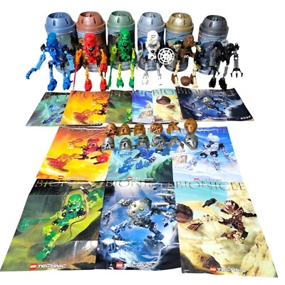 LEGO Bionicle Toa Mata 2001 con máscaras Kanohi doradas y plateadas botes/instrucciones Foto 1 de 4