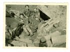 German soldiers in front of dugout, helmet with camouflage cover. WW2 Orig Photo