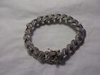 omniore 12mm iced bracelet  (approx 7 1/2  inches) cuban? please see description