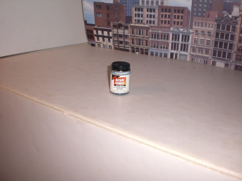 ESMALTE ACRÍLICO PLANO CINZA MÉDIO 2/3 FL. 0Z. TESTORES - Imagem 1 de 2