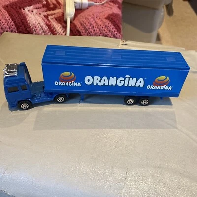 Corgi VOLVO ORANGINA TRUCK (been On Shelf Collecting Dust) Never Played With - Image 1 of 4