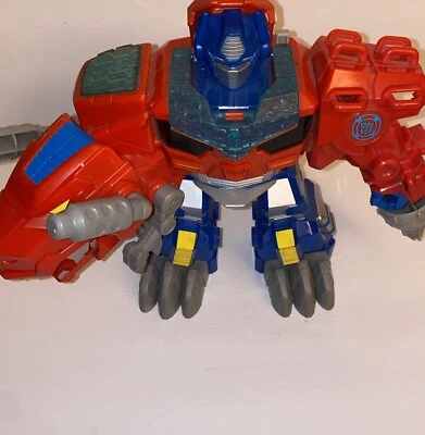 Playskool Transformers Rescue Bots Optimus Primal 9" T-Rex Dinosaur - Image 1 of 4