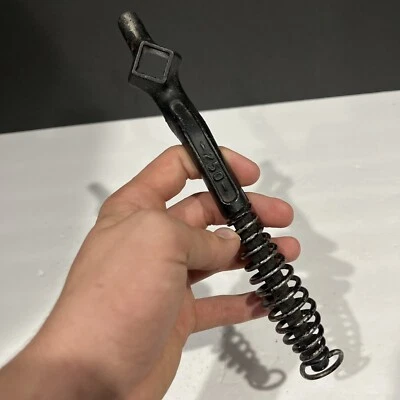 VINTAGE CAST IRON CAN OPENER LID LIFTER SPIRAL HANDLE CAMPING COOKING - Image 1 of 4