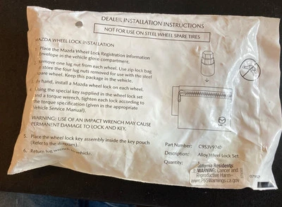 Juego de bloqueo de rueda de aleación de 5 piezas Mazda C9S3V9740M Foto 1 de 3