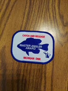  MICHIGAN DNR MASTER ANGLER CATCH & RELEASE FISH PATCH- MICHIGAN DEER - BEAR   - Picture 1 of 1