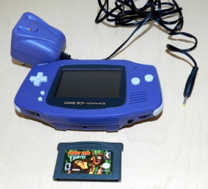 GAME BOY ADVANCE PURPLE SYSTEM WITH DONLEY KONG COUNTRY & MORTAL KOMBAT WORKS - Picture 1 of 5