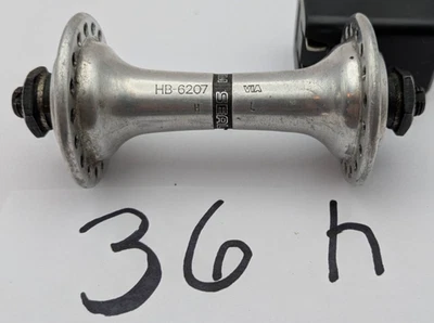 CUBO DIANTEIRO SHIMANO 600 FH-6207 36 furos 100mm JAPÃO LIBERAÇÃO RÁPIDA PRATA 36H - Imagem 1 de 4