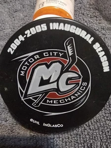Disco de hockey Motor City Mechanics temporada inaugural 2004-05 usado - Imagen 1 de 2