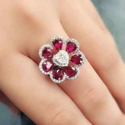 Fabulous Raspberry Pear Cut Rubies With Vivid White Cubic Zirconia Flower Ring - Image 1 of 4