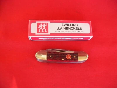 J.A. HENCKELS 5 BLADE CANOE RED JIGGED BONE HANDLES - Image 1 of 4